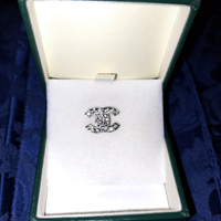 Spilla - orecchino logo Chanel