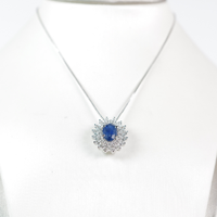 Collana fiore in oro con zaffiri e diamanti