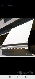Tenda da sole con cassonetto a cadutacon braccetti