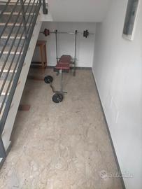 Panca con bilanciere