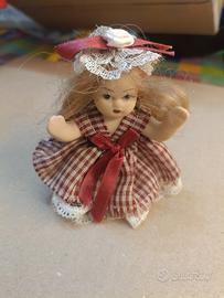 Bambola in porcellana