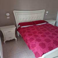 Camera da letto stile neoclassico