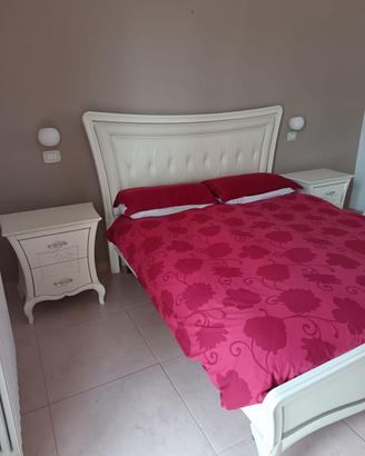 Camera da letto stile neoclassico