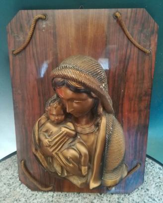 quadro in legno con reliquia in bronzo