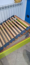 Lettio singolo  e rete  con doghe in legno. 