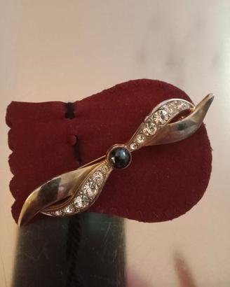 Spilla vintage  con  cabochon nero placcata oro