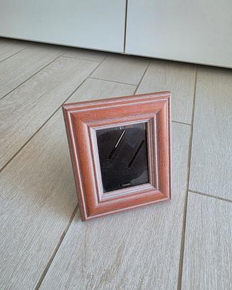 Cornice portafoto in legno lavorato