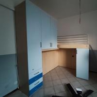 Armadio da cameretta con letto a castello