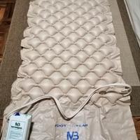 Materassino gonfiabile mai usato,piu compressore