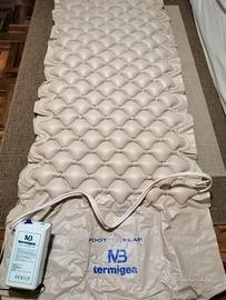 Materassino gonfiabile mai usato,piu compressore