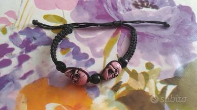 Braccialetto nero teschi rosati dark gotico punk