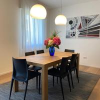 Lampadario moderno in vetro bianco