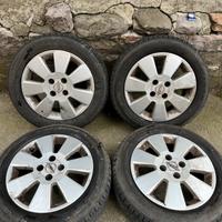 Cerchioni in lega Opel 4 fori 15 pollici + pneumat
