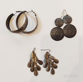 Set di tre paia di orecchini sui toni del bronzo