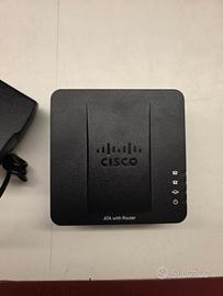 Cisco SPA122 VoIP Gateway con Router