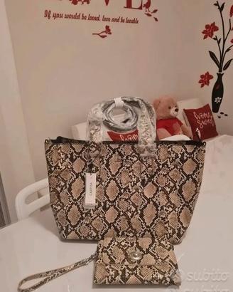 BORSA CON BORSELLINO MARCA CARPISA