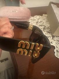 Occhiali da sole miu miu