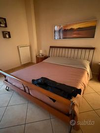 camera da letto completa.