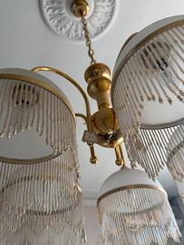 Lampadario laccato oro zecchino