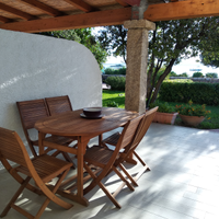 Graziosa villetta fronte mare a La Conia Cannigion