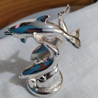 delfini scultura Ottaviani