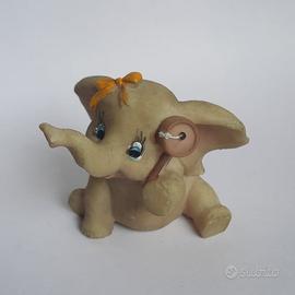 Elefante ceramica fiocco giallo