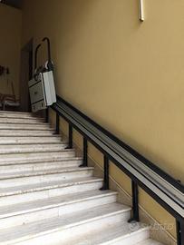 Montascale, trasporto di paziente con carrozzina