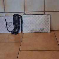 busta/pochette in tela GG di Gucci Museo marrone b