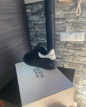 Sneakers platform nere in pelle 