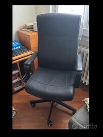 Poltrona ufficio ergonomica alta con braccioli