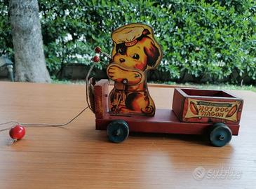 Giocattolo antico in legno e metallo