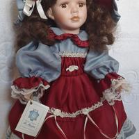 Bambola da collezione in bisquit di porcellana