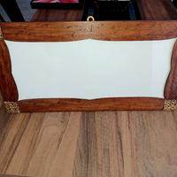 Cornice in legno particolare 