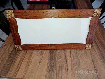 Cornice in legno particolare 