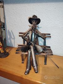 Statuette in Bronzo e in ferro battuto