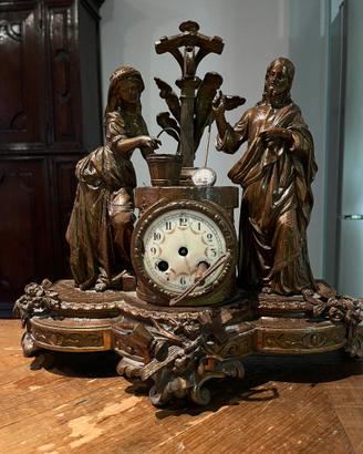 Antico orologio da tavolo in bronzo