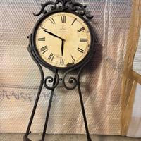 Orologio a pendolo in ferro battuto