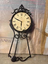 Orologio a pendolo in ferro battuto