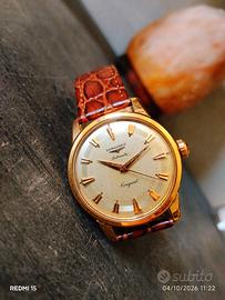 1957 LONGINES CONQUEST 9001 ORO 18KT  