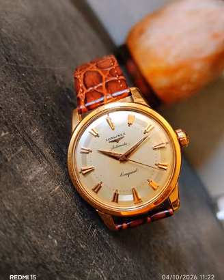 1957 LONGINES CONQUEST 9001 ORO 18KT  