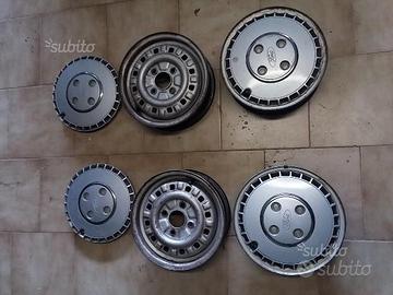 4 cerchi da 13 con copricerchi ford