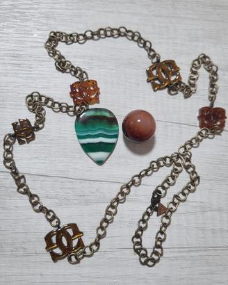 Lotto bijoux collana Guess e pietre ambra