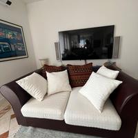 Divano due posti in ecopelle bordò