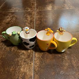 4 tazze da latte con figure di animali in tilievo