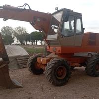 Escavatore gommato