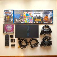 PS2 Fat bundle completo: 2 pad, tel. dvd, giochi