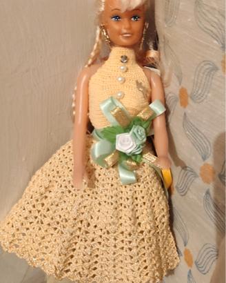 2 Barbi e com vestito 