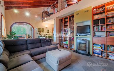 VP14 PORZIONE DI BIFAMILIARE CON MANSARDA E GIARDI