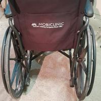 Sedia a rotelle smontabile