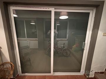 Porta a vetri doppia anta  2,10 x 2,00 metri